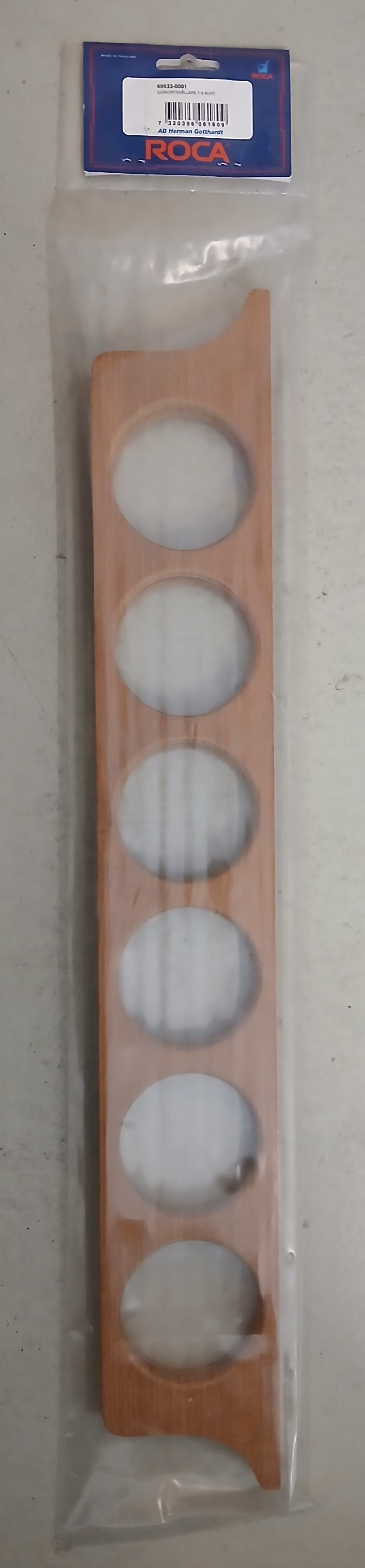 Holder i teak med plads til 6 sammenrullede søkort.